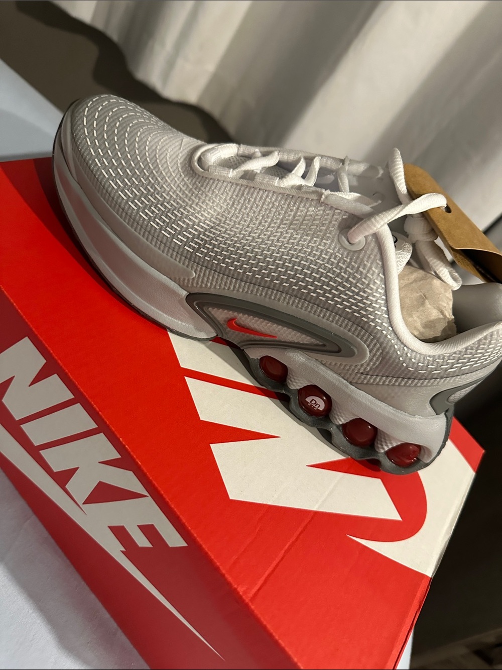 Nike Kids White Sneakers with on Red Accents
